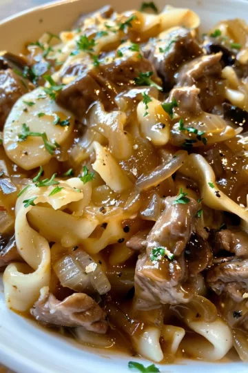 french onion beef and noodles with Honey Mustard Dressing taken with iphone 15 pro max --iw 2 --ar 4:5 --v 6.0 --raw
