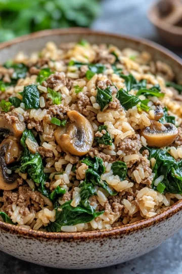 ground beef rice recipes with Spinach and Mushrooms taken with iphone 15 pro max --iw 2 --ar 4:5 --v 6.1 --raw