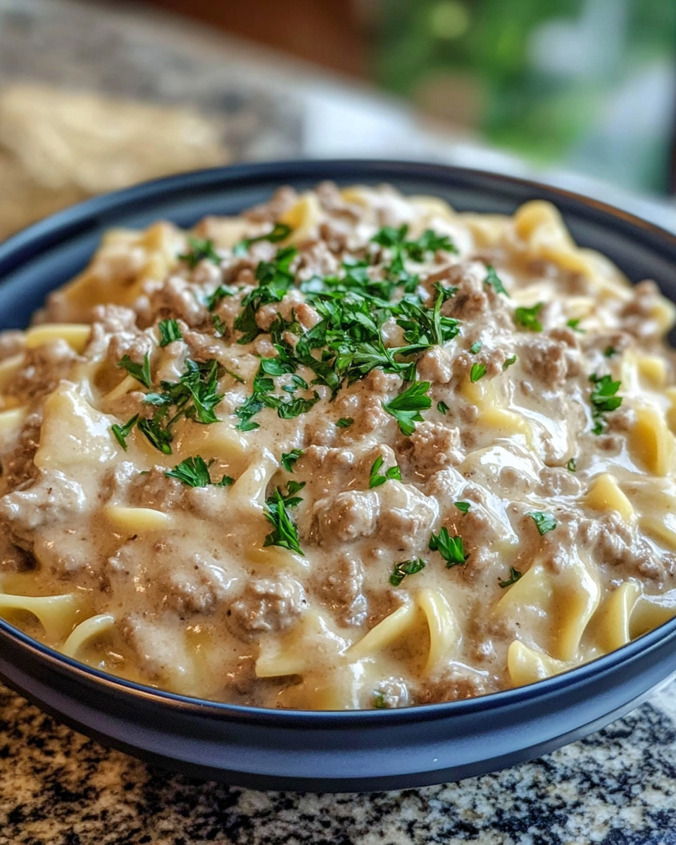 Creamy ground beef stroganoff steaming with mushrooms in pressure cooker