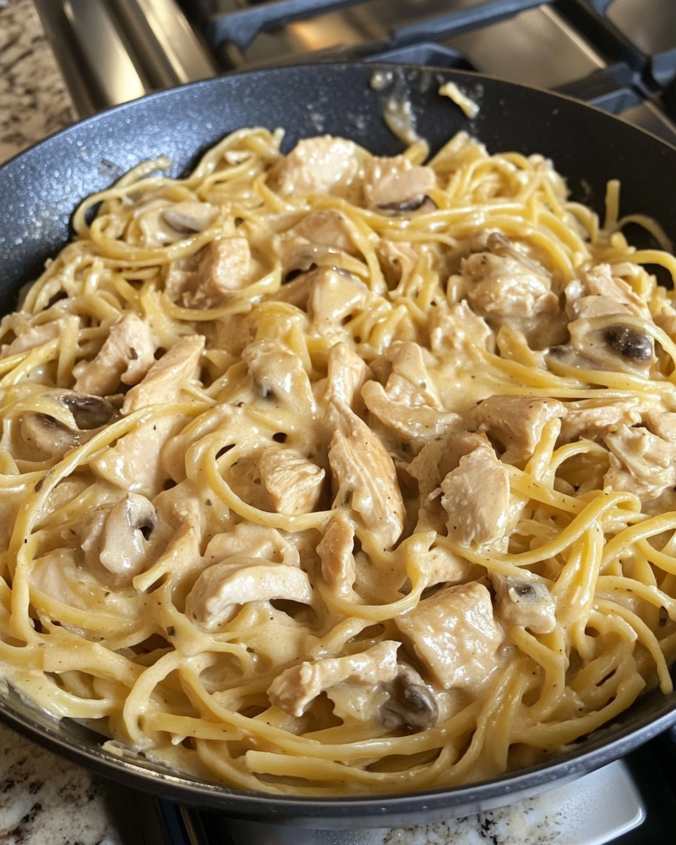 Golden brown cheesy crust on baked creamy chicken tetrazzini