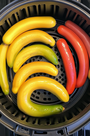 air fryer banana peppers taken with iphone 15 pro max --iw 2 --ar 4:5 --v 6.1 --raw