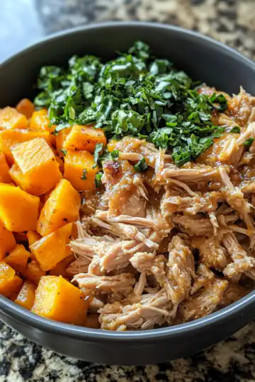 Apple Cider Pulled Pork Bowls With Mashed Sweet Potatoes & Maple Veggies taken with iphone 15 pro max --iw 2 --ar 4:5 --v 6.1 --raw