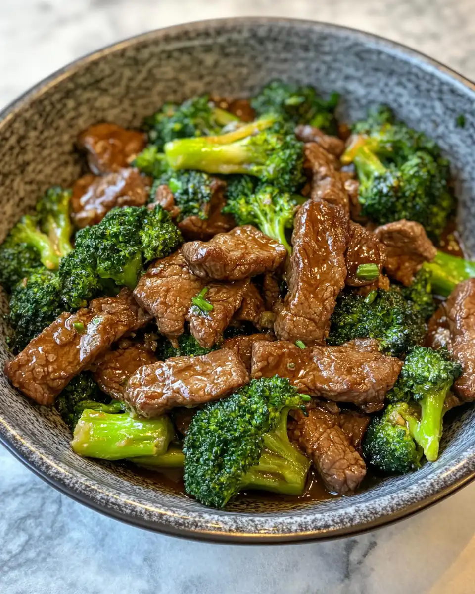 Plated dish of pressure cooker beef with broccoli showing tender beef and crisp broccoli