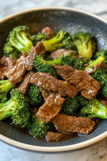 betterthantakeout beef with broccoli taken with iphone 15 pro max --iw 2 --ar 4:5 --v 6.1 --raw