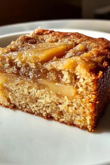Cedrics Somerset Cider Apple Cake taken with iphone 15 pro max --iw 2 --ar 4:5 --v 6.1 --raw