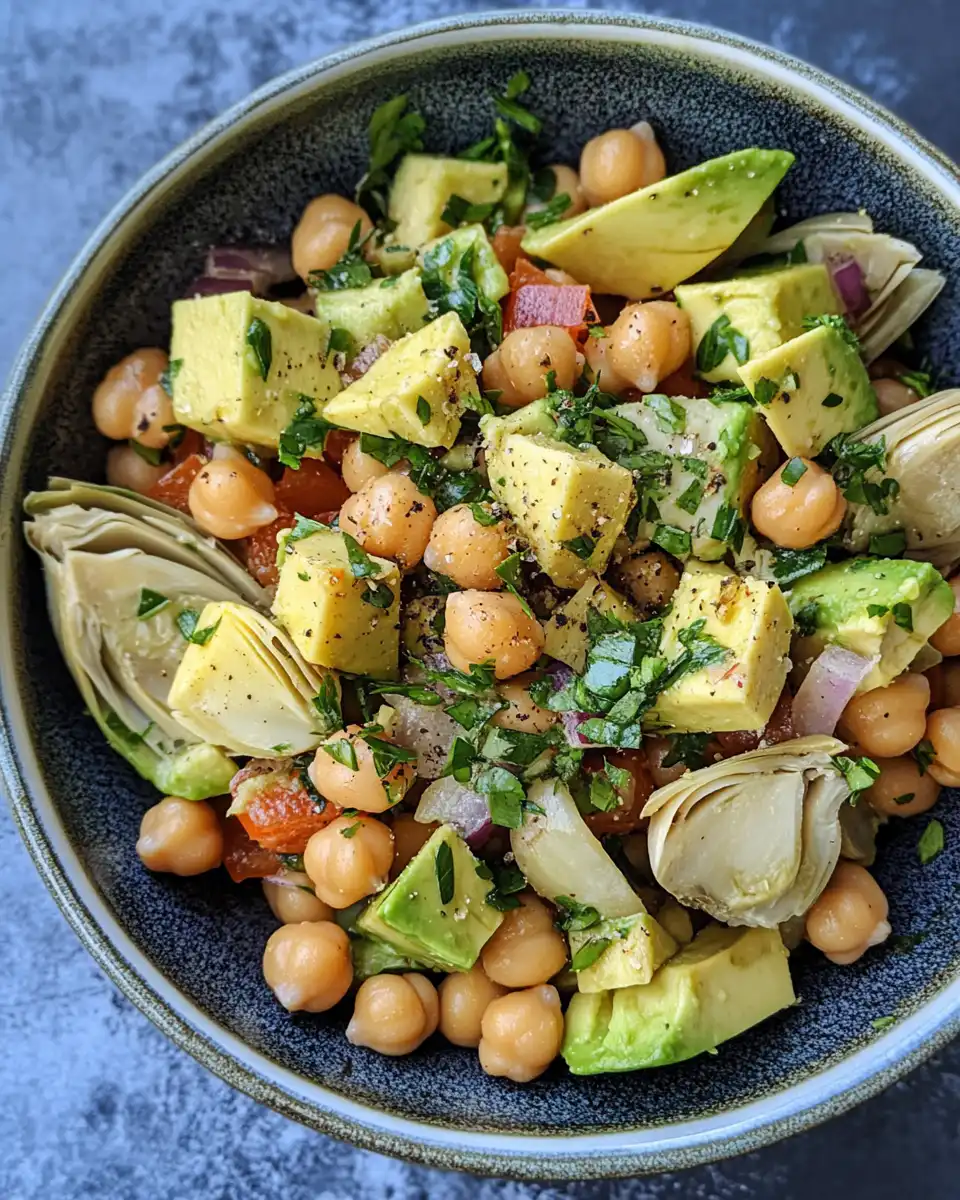 Ingredients for chickpea, avocado and artichoke salad laid out