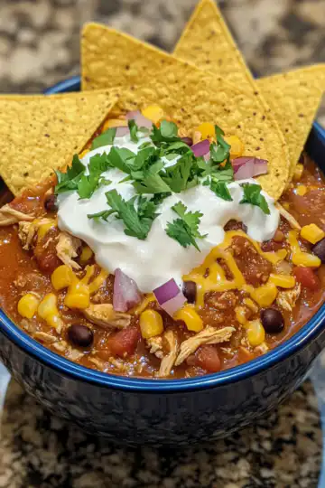 Crock Pot Chicken Taco Chili taken with iphone 15 pro max --iw 2 --ar 4:5 --v 6.1 --raw