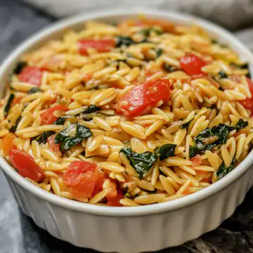 Dump And Bake Vegan Tuscan Orzo taken with iphone 15 pro max --iw 2 --ar 4:5 --v 6.1 --raw