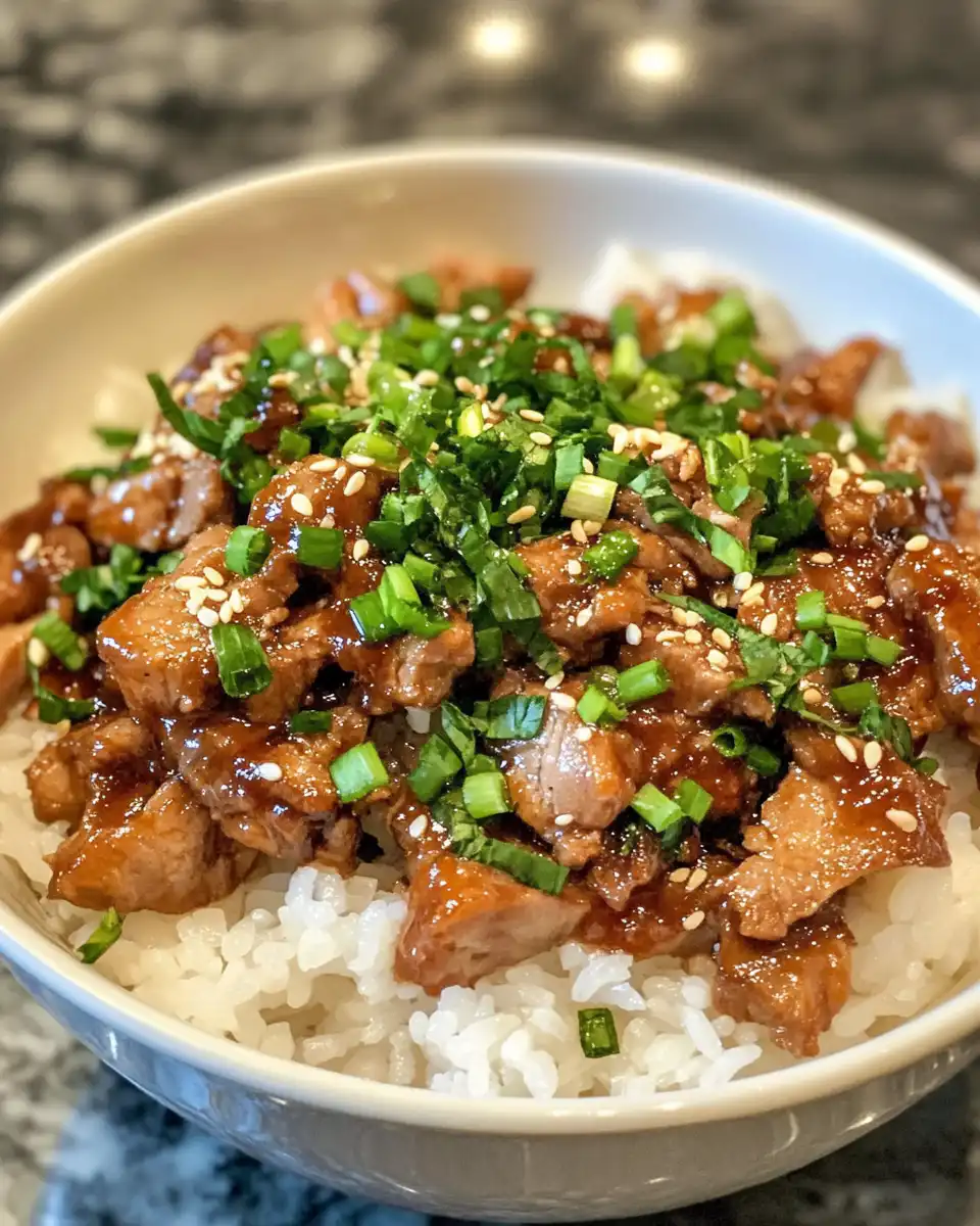 Browning pork in skillet for honey garlic pork recipe