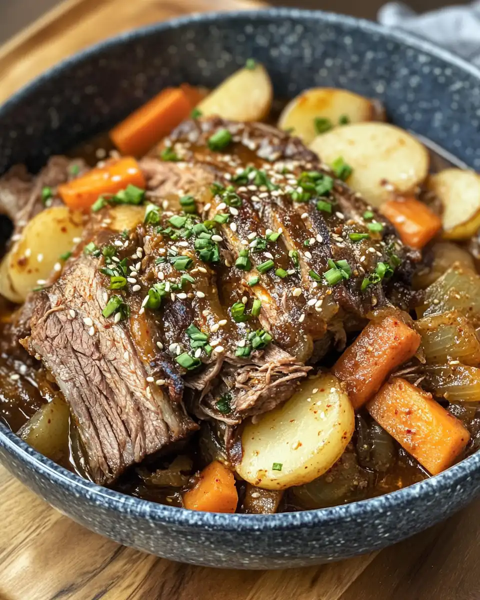 Finished Korean style pot roast ready to serve with tender meat and rich broth