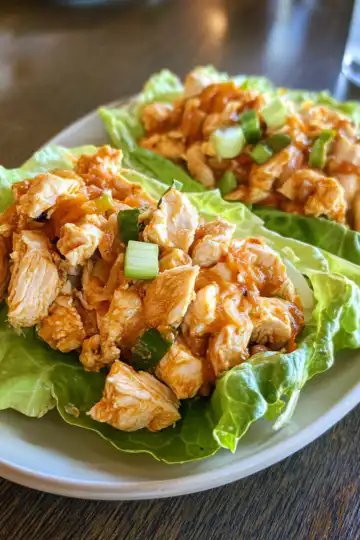 Lazy Dog Chicken Lettuce Wraps taken with iphone 15 pro max --iw 2 --ar 4:5 --v 6.1 --raw