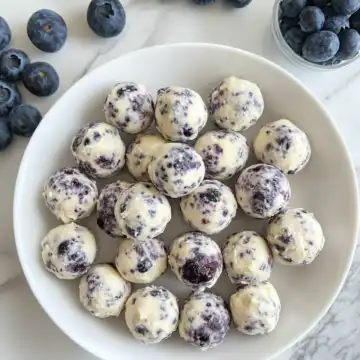 lemon blueberry cottage cheese protein bites taken with iphone 15 pro max --iw 2 --ar 4:5 --v 6.1 --raw