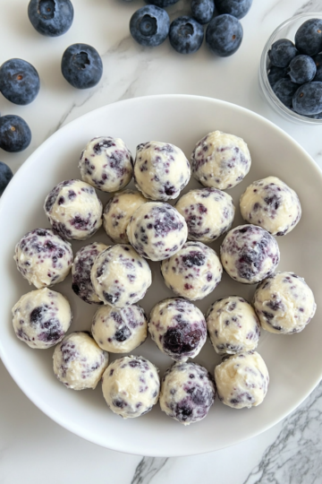 lemon blueberry cottage cheese protein bites taken with iphone 15 pro max --iw 2 --ar 4:5 --v 6.1 --raw