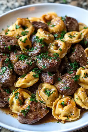 onepan cowboy butter tortellini steak bites recipe taken with iphone 15 pro max --iw 2 --ar 4:5 --v 6.1 --raw