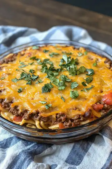 Perfect Crustless Taco Pie taken with iphone 15 pro max --iw 2 --ar 4:5 --v 6.1 --raw