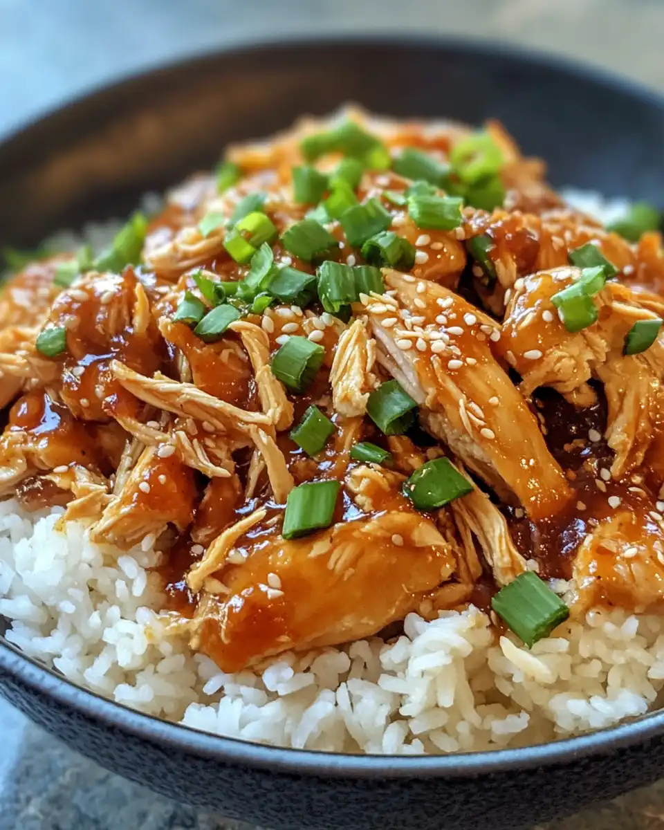 Ingredients including chicken, bell peppers, garlic, and sauces ready to combine in crockpot