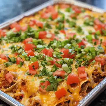 Taco Tray Bake taken with iphone 15 pro max --iw 2 --ar 4:5 --v 6.1 --raw