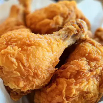 The Original Marry Me Chicken taken with iphone 15 pro max --iw 2 --ar 4:5 --v 6.1 --raw