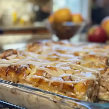 Caramel Apple Cinnamon Roll Casserole taken with iphone 15 pro max --iw 2 --ar 4:5 --v 6.0 --raw