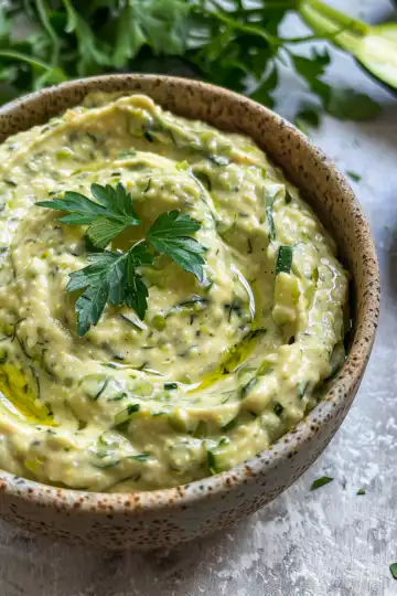 Easy, Creamy & Light Vegan Zucchini Dip taken with iphone 15 pro max --iw 2 --ar 4:5 --v 6.0 --raw