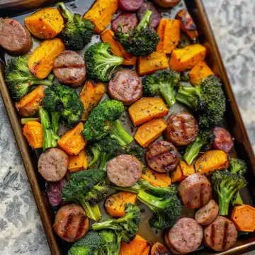 Sheet Pan Sausage, Broccoli, & Sweet Potatoes taken with iphone 15 pro max --iw 2 --ar 4:5 --v 6.0 --raw