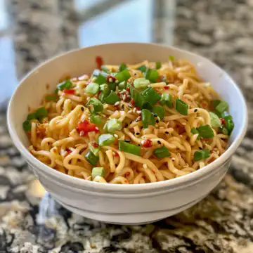 Sweet Chili Garlic Instant Pot Noodles taken with iphone 15 pro max --iw 2 --ar 4:5 --v 6.0 --raw