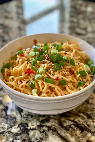 Sweet Chili Garlic Instant Pot Noodles taken with iphone 15 pro max --iw 2 --ar 4:5 --v 6.0 --raw