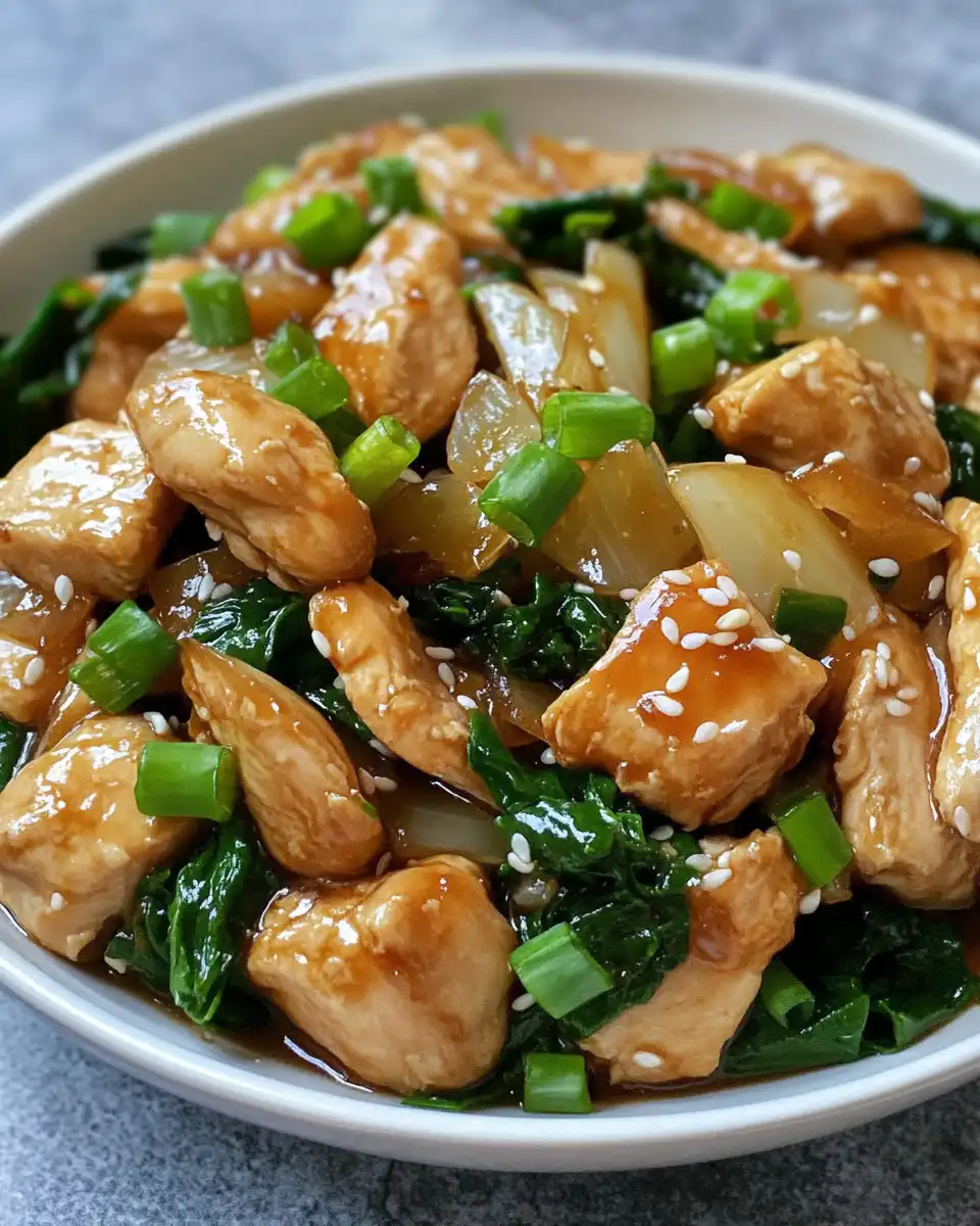Tender cooked chicken and caramelized onions plated and ready to serve