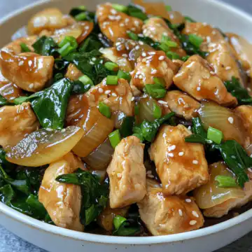 Chicken and Onion Stir Fry taken with iphone 15 pro max --iw 2 --ar 4:5 --v 6.1 --raw