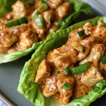 Chicken Lettuce Wraps with Sunflower Butter Sauce taken with iphone 15 pro max --iw 2 --ar 4:5 --v 6.1 --raw